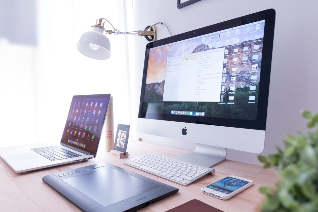 A table set with digital gadgets