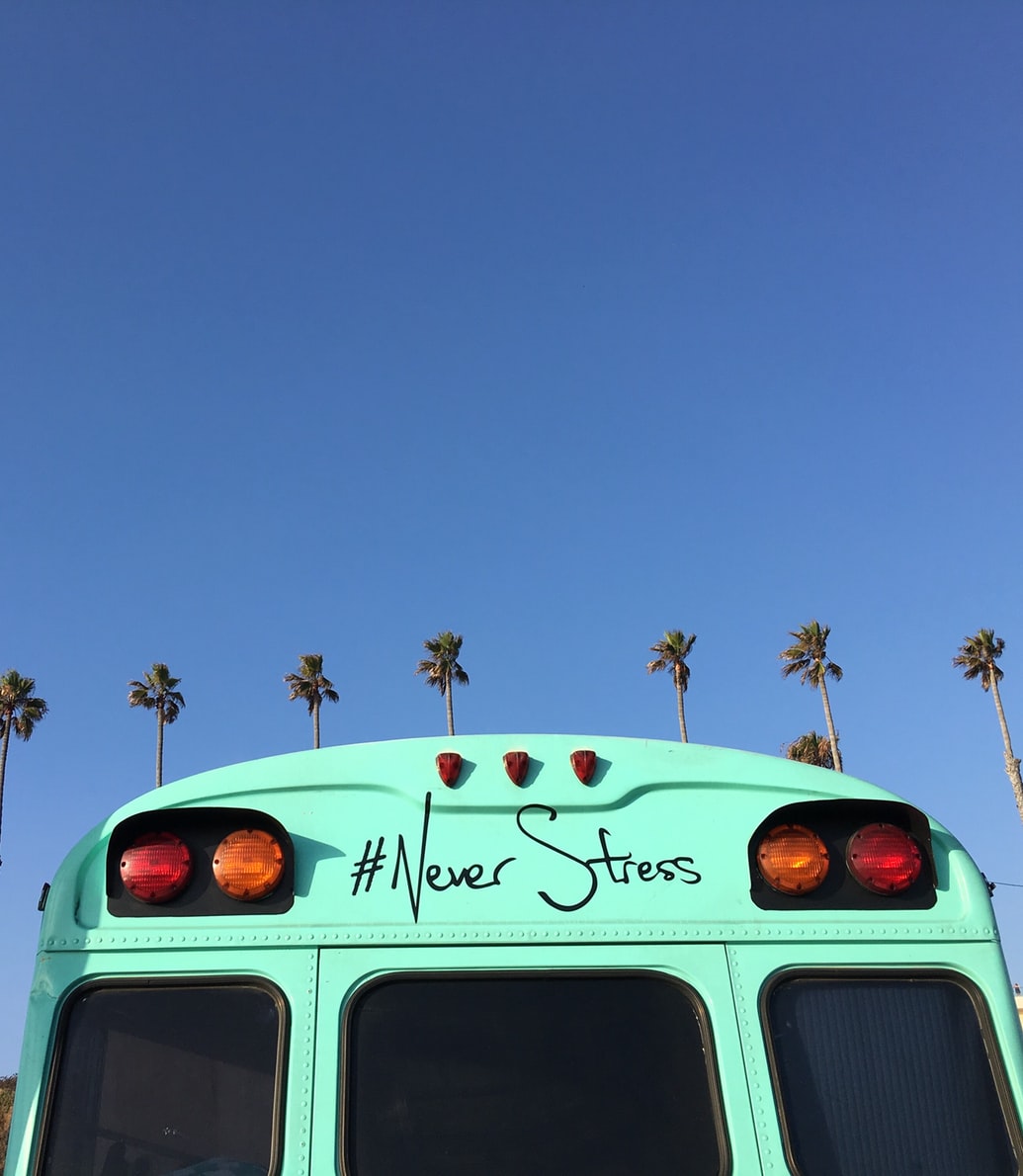 A van with the inscription "Never Stress"